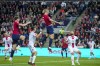 Norway's Erling Haaland, top center, scores during the Euro 2024 group A qualifying soccer match between Norway and Georgia at the Ullevaal stadium in Oslo, Tuesday, Sept. 12 2023. (Fredrik Varfjell/NTB via AP)