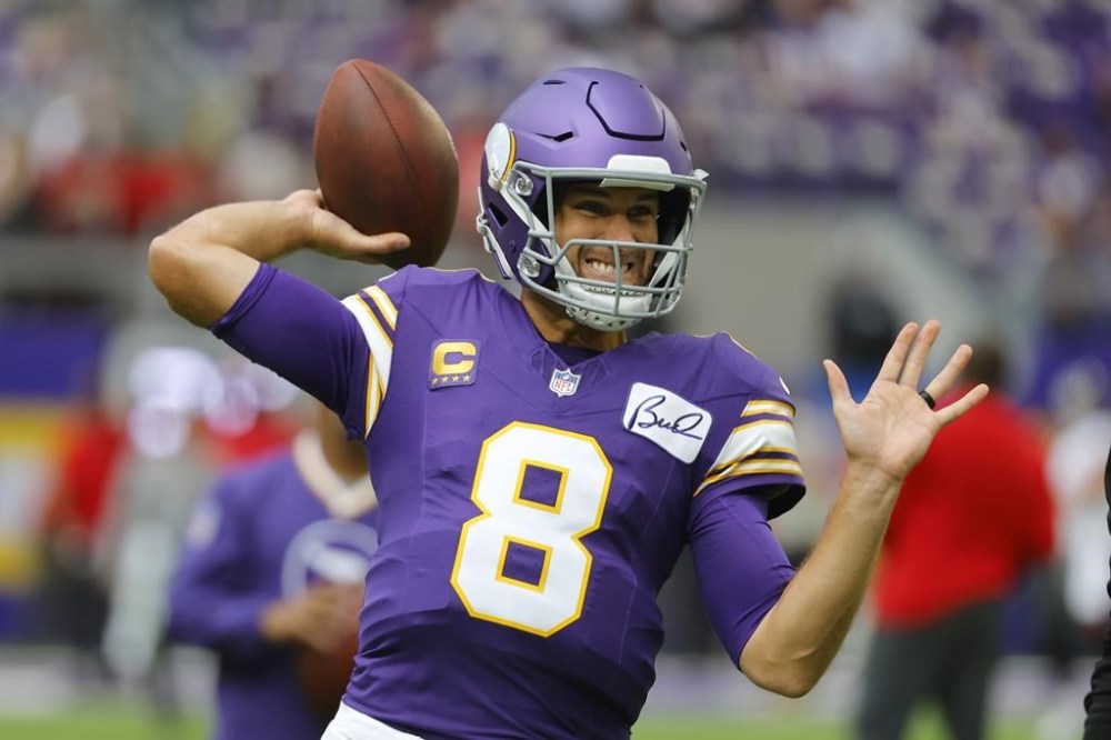 Minnesota Vikings quarterback Kirk Cousins warms up before an NFL football game against the Tampa Bay Buccaneers, Sunday, Sept. 10, 2023, in Minneapolis. (AP Photo/Bruce Kluckhohn)