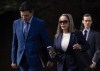 Tamara Lich walks with her lawyer Lawrence Greenspon as they make their way to the courthouse for trial, Wednesday, Sept. 13, 2023 in Ottawa. The defence lawyers for two 