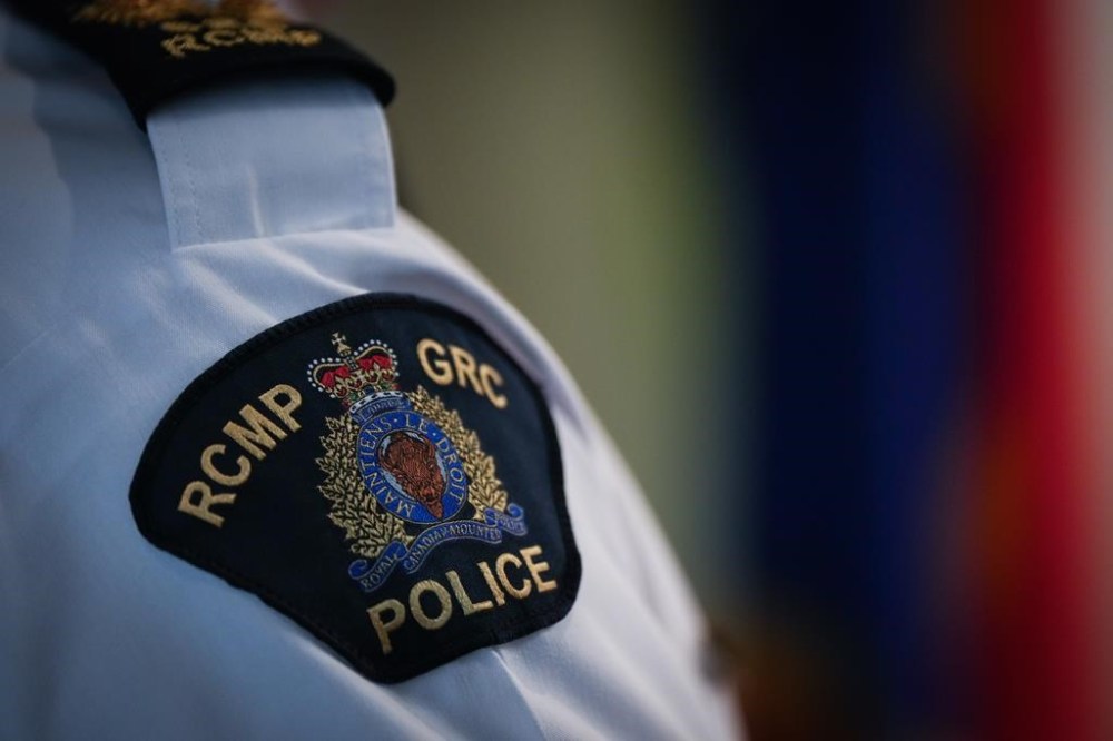 An RCMP patch is seen on the shoulder of an officer, in Surrey, B.C., on Friday, April 28, 2023. The World Sikh Organization of Canada says a Sikh high school student in Kelowna, B.C., was kicked, punched and pepper sprayed in an attack Monday, the second instance of violence against a Sikh youth this year in the city.THE CANADIAN PRESS/Darryl Dyck