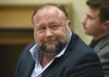 FILE - Infowars founder Alex Jones appears in court to testify during the Sandy Hook defamation damages trial at Connecticut Superior Court in Waterbury, Conn., on Sept. 22, 2022. Lawyers for several Sandy Hook families are criticizing Alex Jones' personal spending as they seek nearly $1.5 billion they won in lawsuits against the Infowars host, for his calling the 2012 Newtown school shooting that killed 26 a hoax. (Tyler Sizemore/Hearst Connecticut Media via AP, Pool, File)