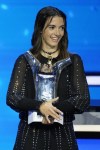 Spain's Aitana Bonmati holds the UEFA Women's Player of the Year award after the 2023/24 UEFA Champions League group stage draw at the Grimaldi Forum in Monaco, Thursday, Aug. 31, 2013. (AP Photo/Daniel Cole)