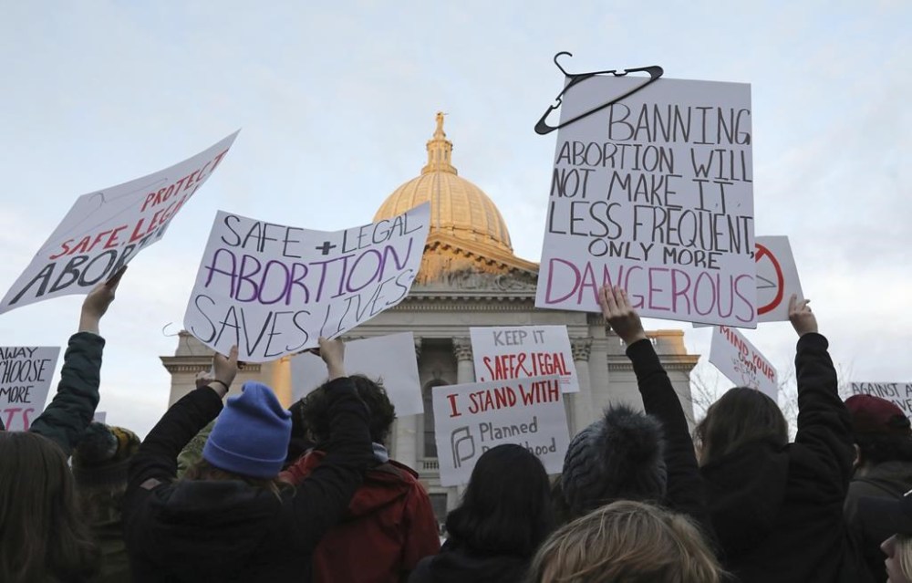 FILE - Demonstrators protest outside the state Capitol in Madison, Wis., Tuesday, May 3, 2022. Planned Parenthood announced Thursday, Sept. 14, 2023, that it will resume offering abortions in Wisconsin next week after a judge ruled that an 1849 law that seemingly banned the procedure actually didn't apply to abortions.(Amber Arnold/Wisconsin State Journal via AP)