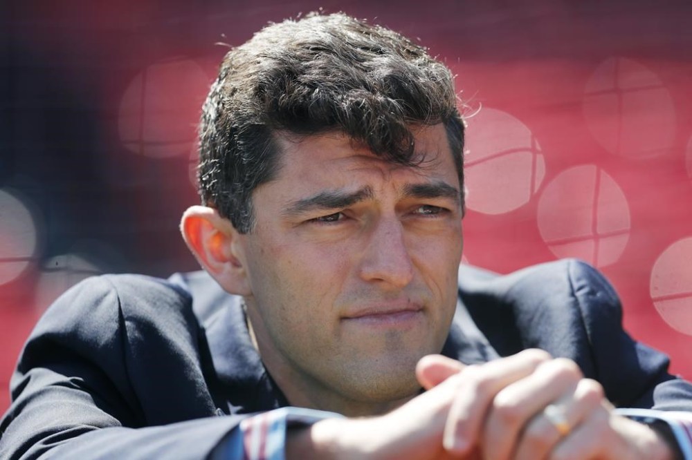 FILE - Boston Red Sox baseball executive Chaim Bloom watches warmups before a baseball game against the Minnesota Twins, Friday, April 15, 2022, in Boston. The Red Sox fired Chief Baseball Officer Chaim Bloom on Thursday, Sept. 14, 2023,as the team stumbled toward a third last-place finish in four seasons. (AP Photo/Michael Dwyer, File)
