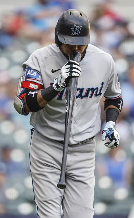 Miami Marlins' Luis Arraez reacts after flying out against the Milwaukee Brewers during the fifth inning of a baseball game Thursday, Sept. 14, 2023, in Milwaukee. (AP Photo/Jeffrey Phelps)
