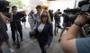 Lawyer Lawrence Greenspon walks with Tamara Lich in to the courthouse on the first day of trial, in Ottawa, Tuesday, Sept. 5, 2023. The lawyers involved in the case of two prominent 