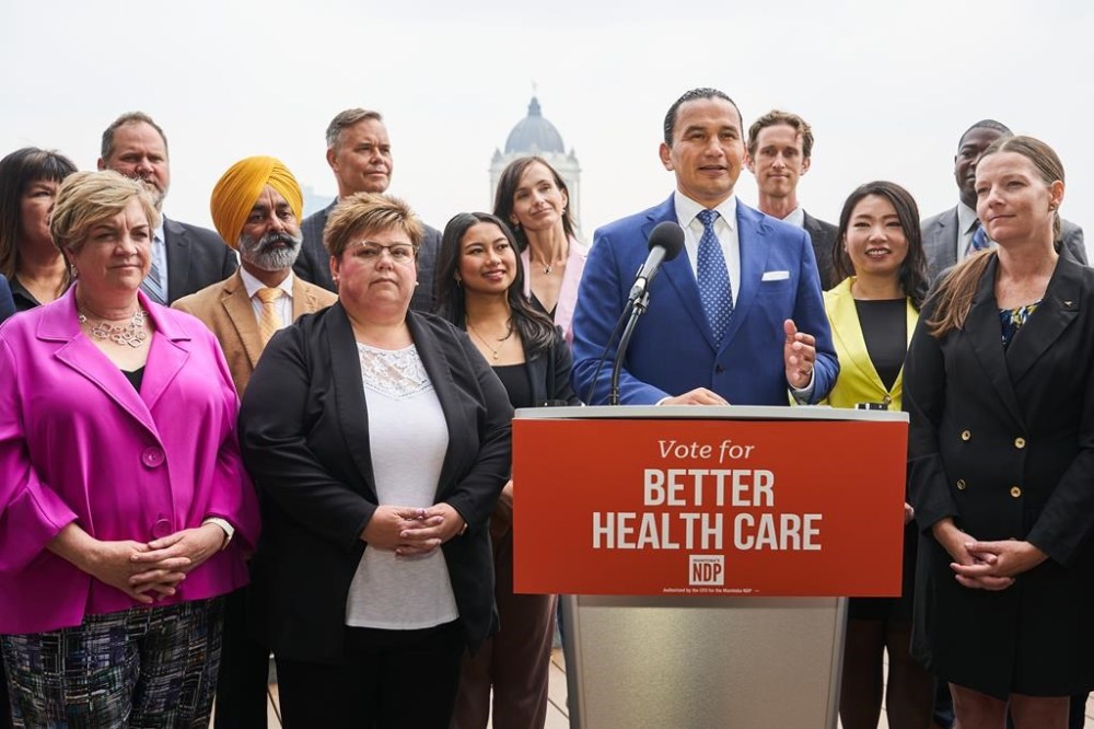 Manitoba NDP Leader Wab Kinew speaks to media during a press conference to kick off the 2023 Manitoba election campaign at the West Broadway Commons in Winnipeg on Tuesday, September 5, 2023. Hospitals are becoming a familiar backdrop for the New Democrats in the Manitoba election campaign. THE CANADIAN PRESS/David Lipnowski