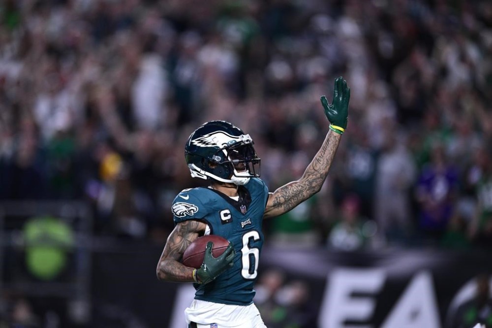 Philadelphia Eagles wide receiver DeVonta Smith (6) celebrates his touchdown during the second half of an NFL football game against the Minnesota Vikings on Thursday, Sept. 14, 2023, in Philadelphia. (AP Photo/Derik Hamilton)