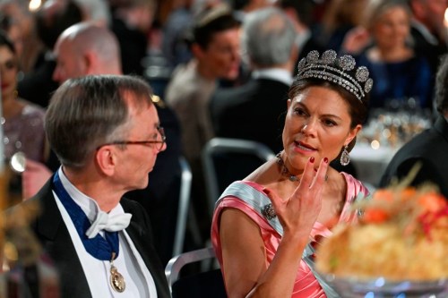FILE - Nobel Prize laureate in Physiology or Medicine Svante Paabo and Sweden's Crown Princess Victoria attend the Nobel Prize Banquet at the Town Hall in Stockholm, Saturday Dec. 10 2022. (Pontus Lundahl/TT via AP, File)