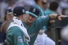 FILE - Seattle Mariners manager Scott Servais, right, talks with starting pitcher George Kirby in the dugout during the seventh inning of a baseball game against the Tampa Bay Rays, Saturday, July 1, 2023, in Seattle. When it comes to tough conversations with players, most every baseball manager agrees that being truthful and straight forward is the best approach. (AP Photo/Stephen Brashear, File)
