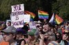 People protest at the Legislative Building in Regina, Saturday, Sept. 2, 2023. Saskatchewan's child advocate has released a report saying the province's pronoun policy in schools violates rights and is discriminatory.THE CANADIAN PRESS/Michael Bell
