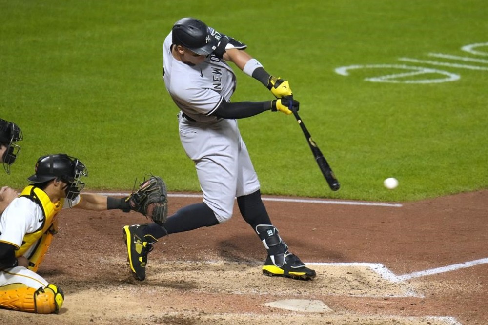 New York Yankees' Aaron Judge hits an RBI single off Pittsburgh Pirates relief pitcher Thomas Hatch during the sixth inning of a baseball game in Pittsburgh, Friday, Sept. 15, 2023. (AP Photo/Gene J. Puskar)