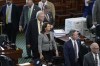 Texas state Sen. Angela Paxton, R-McKinney, center, and fellow senators serving as jurors arrive for closing arguments in the impeachment trial for her husband, suspended Texas Attorney General Ken Paxton, in the Senate Chamber at the Texas Capitol, Friday, Sept. 15, 2023, in Austin, Texas. (AP Photo/Eric Gay)