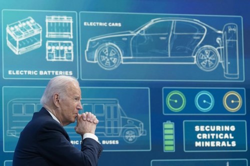 FILE - President Joe Biden listens during an event in the South Court Auditorium in the Eisenhower Executive Office Building on the White House complex, Tuesday, Feb. 22, 2022, in Washington. Two of President Joe Biden's top goals, fighting climate change and expanding the middle class by supporting unions, are colliding in the key battleground state of Michigan as the United Auto Workers go on strike against the country's biggest car companies. (AP Photo/Alex Brandon, File)