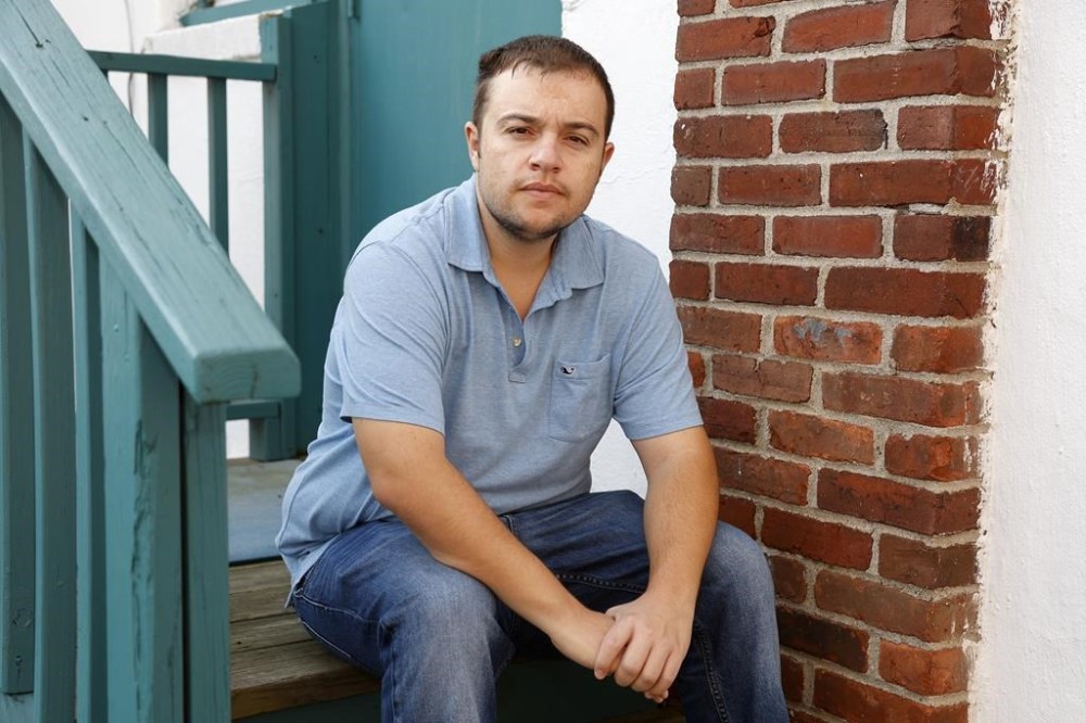 Mike Bouboulis sits for a portrait in Arlington, Mass., on Wednesday, Sept. 13, 2023. Bouboulis has taken Saxenda, Mounjaro or Ozempic, a Novo diabetes drug with the same active ingredient as Wegovy, since around 2019. In the past year after their popularity exploded, refilling a prescription involved calling five to seven pharmacies. “They all know what you’re calling for, and they all have the same answer: ‘I don’t know. We’ll see tomorrow,’