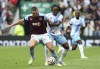 Aston Villa's John McGinn, left, and Crystal Palace's Eberechi Eze battle for the ball during the English Premier League soccer match between Aston Villa and Crystal Palace at Villa Park, in Birmingham, England, Saturday, Sept. 16, 2023. (Barrington Coombs/PA via AP)