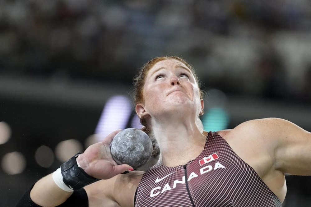 Canadian shot putter Sarah Mitton backed up her world championship silver medal with another silver Saturday in Diamond League. Mitton, makes an attempt in the Women's shot put final during the World Athletics Championships in Budapest, Hungary, Saturday, Aug. 26, 2023. THE CANADIAN PRESS/AP-Matthias Schrader