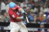 Miami Marlins' Jake Burger hits a two-run home run during the eighth inning of a baseball game against the Atlanta Braves, Saturday, Sept. 16, 2023, in Miami. (AP Photo/Lynne Sladky)
