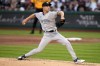 New York Yankees starting pitcher Luke Weaver delivers during the first inning of the team's baseball game against Pittsburgh Pirates in Pittsburgh, Saturday, Sept. 16, 2023. (AP Photo/Gene J. Puskar)