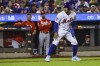 New York Mets' Francisco Lindor steps off third base as he eyes a run to home plate during the first inning of a baseball game against the Cincinnati Reds, Saturday, Sept. 16, 2023, in New York. (AP Photo/Bebeto Matthews)