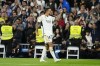 Real Madrid's Joselu celebrates scoring his side's 2nd goal during Spanish La Liga soccer match between Real Madrid and Real Sociedad at the Santiago Bernabéu stadium in Madrid, Spain, Sunday, Sept. 17, 2023. (AP Photo/Jose Breton)