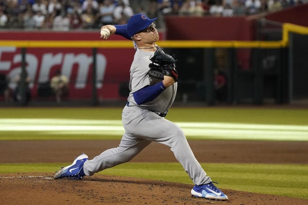 Chicago Cubs starting pitcher Jordan Wicks throws against the Arizona Diamondbacks during the first inning of a baseball game, Sunday, Sept. 17, 2023, in Phoenix. (AP Photo/Darryl Webb)