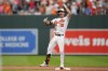 Baltimore Orioles' Adam Frazier reacts after hitting a game-tying double to score pinch runner Jorge Mateo from first base in the ninth inning of a baseball game against the Tampa Bay Rays, Sunday, Sept. 17, 2023, in Baltimore. The Orioles won 5-4 in 11 innings to clinch a playoff spot. (AP Photo/Julio Cortez)