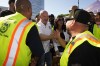 FILE - Sean O'Brien, Teamsters General President, center, greets teamsters and United Parcel Service workers at a rally in downtown Los Angeles on July 19, 2023. O’Brien, a Boston-area native who grew up in a Teamsters family, worked with then-president James Hoffa (the son of Jimmy Hoffa, the former Teamsters leader) as the chief negotiator in the Teamsters' 2017 contract talks with UPS. (AP Photo/Damian Dovarganes, File)