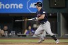 Boston Red Sox's Rob Refsnyder follows through on a two-run single in the eighth inning of a baseball game against the Texas Rangers in Arlington, Texas, Monday, Sept. 18, 2023. Connor Wong and Luis Urias scored on the hit. (AP Photo/Tony Gutierrez)