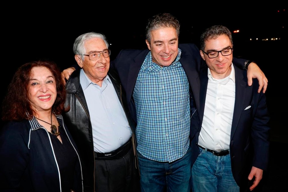 Family members greet freed Americans Siamak Namazi, Morad Tahbaz and Emad Shargi, as well as two returnees whose names have not yet been released by the U.S. government, who were released in a prisoner swap deal between U.S and Iran, as they arrive at Davison Army Airfield, Tuesday, Sept. 19, 2923 at Fort Belvoir, Va. (Jonathan Ernst/Pool via AP)