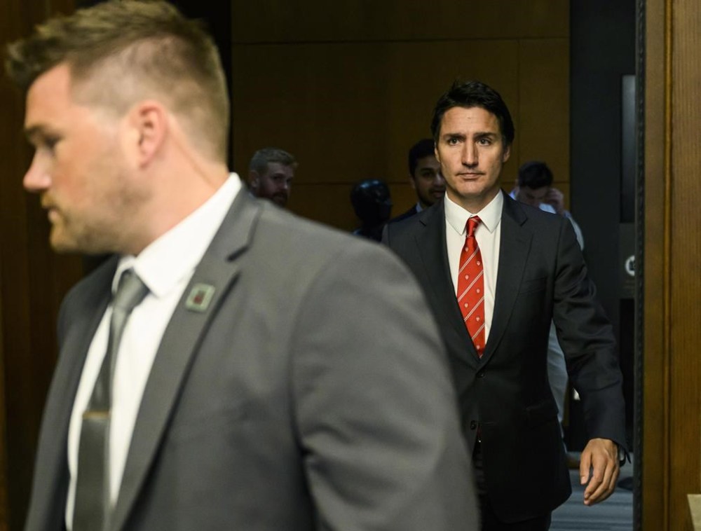 Prime Minister Justin Trudeau leaves the House of Commons on Parliament Hill in Ottawa, after making a statement that Canadian authorities had intelligence that India was responsible for the June fatal shooting of a prominent Sikh leader in Surrey, B.C., on Monday, Sept. 18, 2023. Trudeau is calling on India to take seriously allegations that the country had a role in the death of a Canadian citizen. THE CANADIAN PRESS/Justin Tang