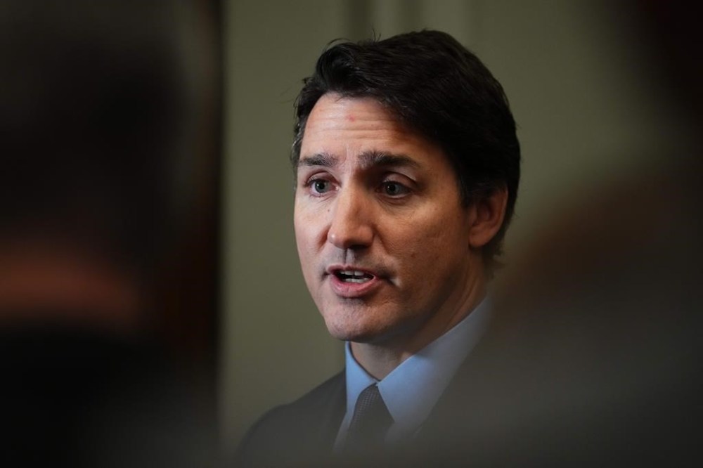 Prime Minister Justin Trudeau talks to media on his way to a cabinet meeting on Parliament Hill in Ottawa on Tuesday, Sept.19, 2023.THE CANADIAN PRESS/Sean Kilpatrick