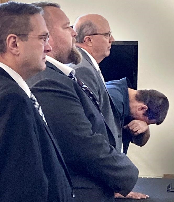 CORRECTS TO THOMAS, NOT TOM - Defendant Eric Molitor breaks down after hearing the jury verdict of not guilty in the trial tied to the plot to kidnap Michigan Gov. Gretchen Whitmer, in Bellaire, Mich., on Friday, Sept. 15, 2023. From left are defense attorney Thomas Siver with his client, defendant Michael Null, and defense attorney William Barnett with his client, Molitor. A jury acquitted three men in the last trial connected to a plan to kidnap Michigan Gov. Gretchen Whitmer, a scheme that was portrayed as an example of homegrown terrorism on the eve of the 2020 presidential election. (Mardi Link/Traverse City Record-Eagle via AP)