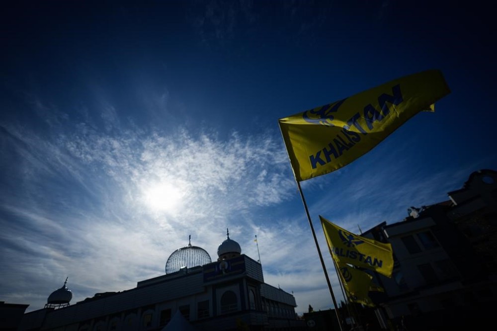 The shooting death of Hardeep Singh Nijjar in Surrey, B.C., has touched off a foreign affairs crisis between Canada and India over the deceased Sikh leader's role in the Khalistan separatism. Khalistan flags are seen outside the Guru Nanak Sikh Gurdwara Sahib in Surrey, B.C., Monday, Sept. 18, 2023. THE CANADIAN PRESS/Darryl Dyck