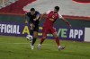 Al Nassr's Cristiano Ronaldo, left, vies for the ball with Iran's Persepolis Danial Esmaeilifar during their AFC Champions League soccer match at the Azadi Stadium in Tehran, Iran, Tuesday, Sept. 19, 2023. (AP Photo/Vahid Salemi)