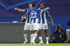 Porto's Galeno, right, celebrates after he scored the opening goal during the UEFA Champions League Group H soccer match between Shakhtar Donetsk and FC Porto in Hamburg, Germany, Tuesday, Sept. 19, 2023. (AP Photo/Martin Meissner)
