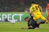 PSG's Warren Zaire-Emery, bottom, is challenged by Dortmund's Emre Can during the Champions League group F soccer match between Paris Saint-Germain and Borussia Dortmund, at the Parc des Princes stadium in Paris, France, Tuesday, Sept. 19, 2023. (AP Photo/Michel Euler)