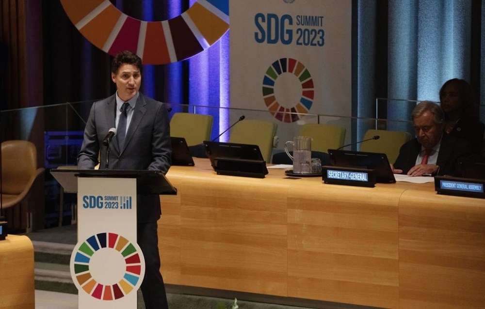United Nations Secretary-General Antonio Guterres listens as Prime Minister Justin Trudeau speaks at the Sustainable Development Goals closing session Tuesday, September 19, 2023 in New York. THE CANADIAN PRESS/Adrian Wyld