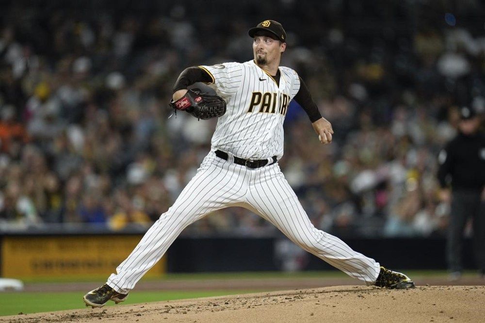 San Diego Padres starting pitcher Blake Snell works against a Colorado Rockies batter during the second inning of a baseball game Tuesday, Sept. 19, 2023, in San Diego. (AP Photo/Gregory Bull)