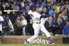 Chicago Cubs' Alexander Canario watches his grand slam off Pittsburgh Pirates relief pitcher Kyle Nicolas during the eighth inning of a baseball game Tuesday, Sept. 19, 2023, in Chicago. (AP Photo/Charles Rex Arbogast)