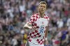 Croatia's Ivan Perisic celebrates after Croatia's Bruno Petkovic scored his side's opening goal during the Euro 2024 group D qualifying soccer match between Croatia and Latvia at Rujevica stadium in Rijeka, Croatia, Friday, Sept. 8, 2023. (AP Photo/Darko Bandic)