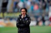 Montreal Impact coach Mauro Biello watches his team from the sideline during an MLS soccer match against the Philadelphia Union on Saturday, April 22, 2017, in Chester, Pa. THE CANADIAN PRESS/AP/Michael Perez