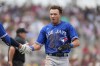 The Toronto Blue Jays selected outfielder Cam Eden to the big-league roster on Wednesday and optioned infielder Ernie Clement to Triple-A Buffalo. Toronto Blue Jays Cam Eden is greeted after scoring on an RBI double by Rainer Nunez in the fourth inning of a spring training baseball game against the Boston Red Sox in Fort Myers, Fla., Friday, March 10, 2023. THE CANADIAN PRESS/AP-Gerald Herbert
