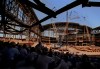 FILE - Construction workers look on as the final piece of structural steel is lifted into place at Bank One Ballpark in downtown Phoenix, the future home of the major league expansion team Arizona Diamondbacks, Friday, Aug. 8, 1997. The Tampa Bay Rays are finalizing plans for a new ballpark in downtown St. Petersburg, which is obviously a positive development for baseball fans in central Florida. Indirectly, it could also mean great things for baseball fans in a few other cities. (AP Photo/Eric Drotter, File)