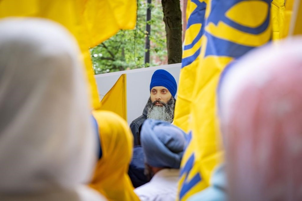 Protesters gather outside the Consulate of India in Vancouver on Saturday, June 24, 2023, during a protest over the shooting of Hardeep Singh Nijjar. The Vancouver Police Department says it's beefing up security outside India's Consulate after Prime Minister Justin Trudeau said this week there was credible intelligence about a potential link between India's government and the killing of a Sikh community leader in B.C. THE CANADIAN PRESS/Ethan Cairns