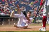 Washington Nationals' Jacob Young scores on a double by CJ Abrams during the second inning of a baseball game against the Chicago White Sox at Nationals Park, Wednesday, Sept. 20, 2023, in Washington. (AP Photo/Andrew Harnik)