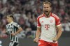 Bayern's Harry Kane celebrates after scoring his side's third goal from a penalty kick during the Champions League group A soccer match between Bayern Munich and Manchester United at the Allianz Arena stadium in Munich, Germany, Wednesday, Sept. 20, 2023. (AP Photo/Matthias Schrader)