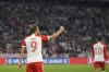 Bayern's Harry Kane, left, celebrates after scoring his side's third goal from a penalty kick during the Champions League group A soccer match between Bayern Munich and Manchester United at the Allianz Arena stadium in Munich, Germany, Wednesday, Sept. 20, 2023. (AP Photo/Matthias Schrader)