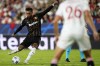 Lens' Angelo Fulgini scores his side's 2nd goal during the Champions League Group B soccer match between Sevilla and Lens at the Ramon Sanchez-Pizjuan in Seville, Spain, Wednesday. Sept. 20, 2023. (AP Photo/Jose Breton)