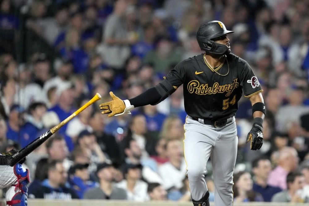 Pittsburgh Pirates' Joshua Palacios tosses his bat after hitting a three-run home run off Chicago Cubs relief pitcher Jose Cuas during the fourth inning of a baseball game Wednesday, Sept. 20, 2023, in Chicago. (AP Photo/Charles Rex Arbogast)